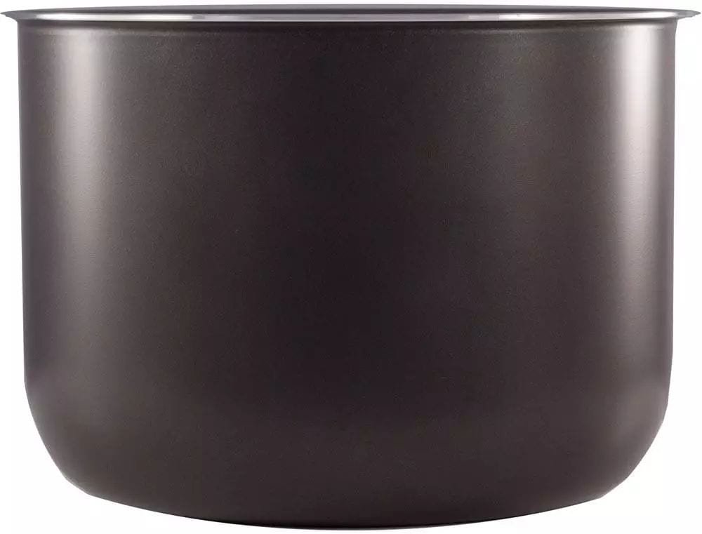 Black ceramic coffee cup for modern kitchen decor and coffee lovers.