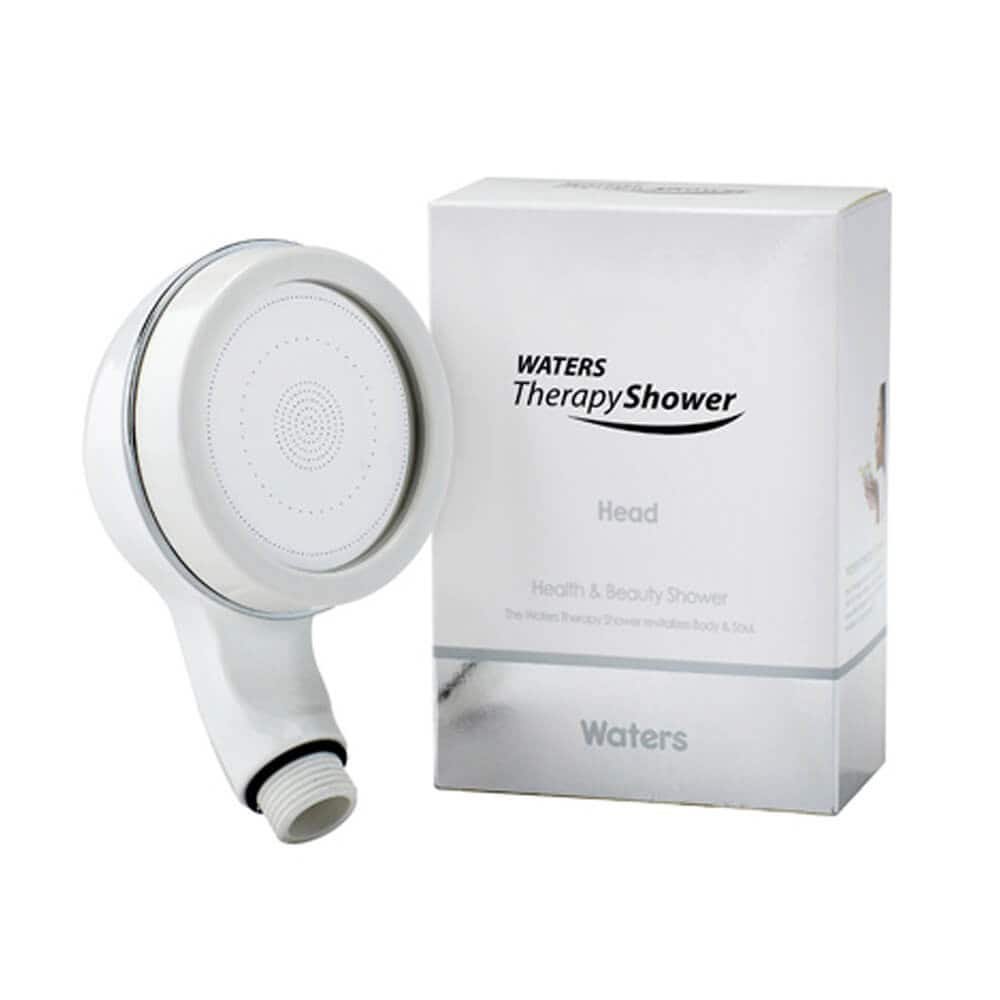 Shower head and box labeled Waters Therapy Shower for health and beauty, designed to improve skin and hair condition through water therapy technology.